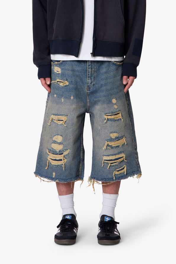 RETROFOLD ULTRA BAGGY REPAIRED DENIM SHORTS