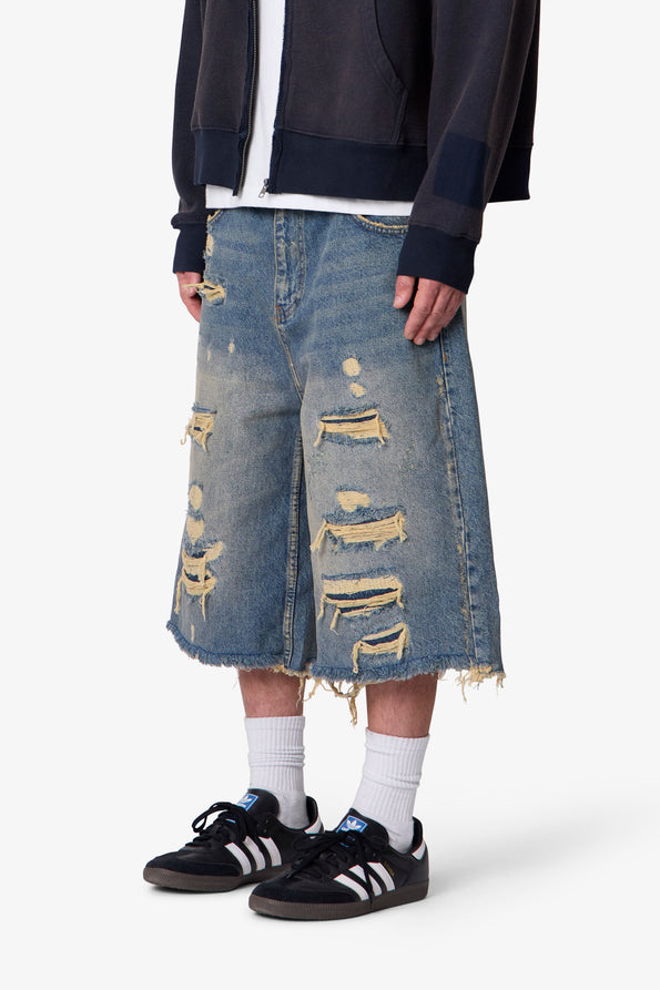 RETROFOLD ULTRA BAGGY REPAIRED DENIM SHORTS