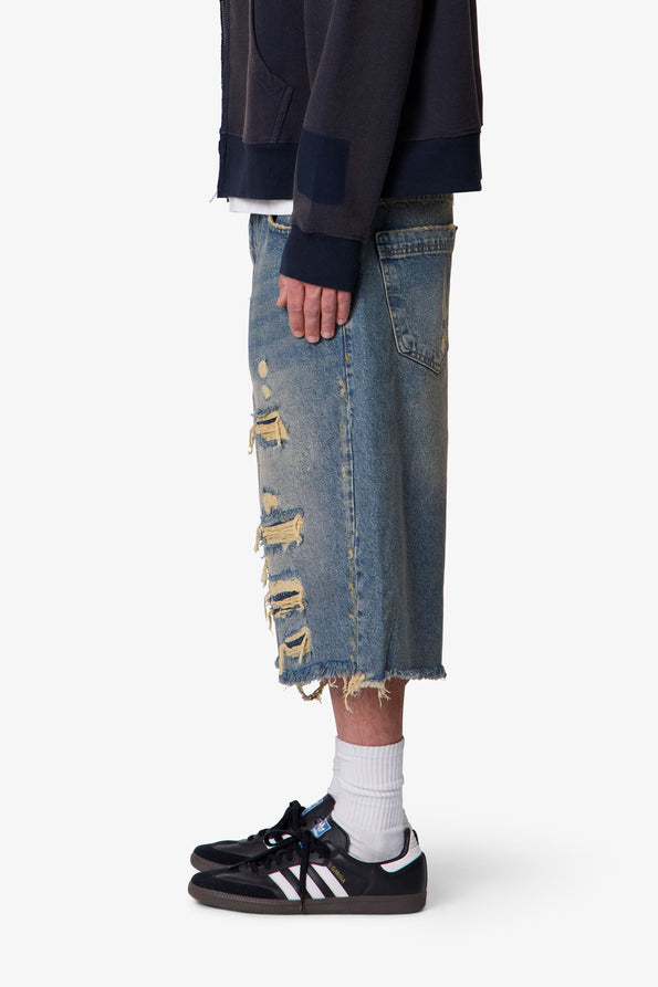 RETROFOLD ULTRA BAGGY REPAIRED DENIM SHORTS