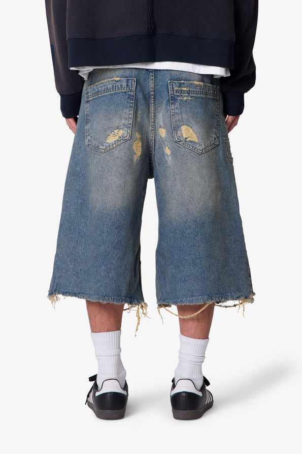 RETROFOLD ULTRA BAGGY REPAIRED DENIM SHORTS